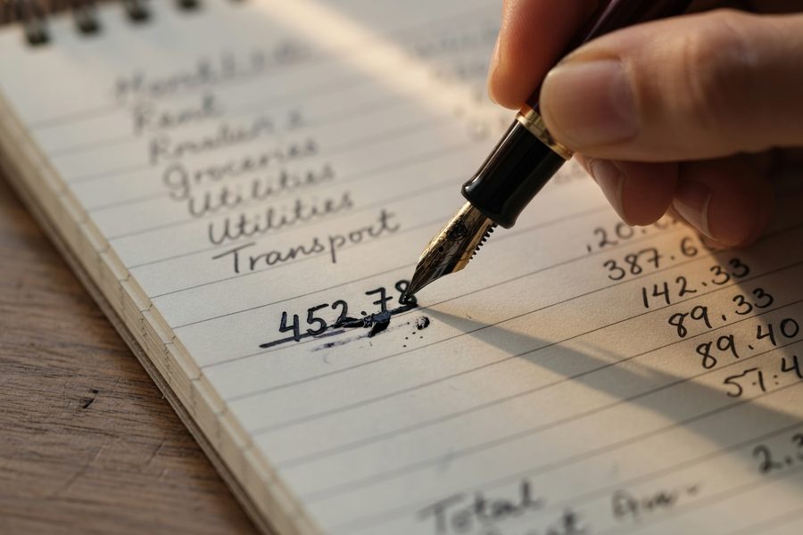 Freelancer reviewing annual retirement account contributions and portfolio allocation on a financial dashboard