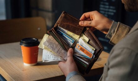 Graphic showing how small daily purchases like coffee, food delivery, and subscriptions accumulate into thousands of dollars yearly