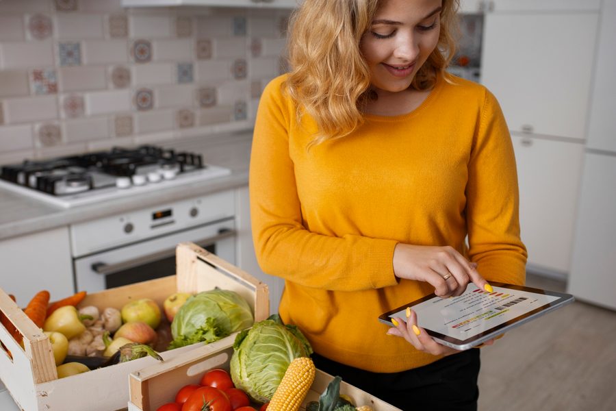 Fridge stocked haphazardly with duplicate items after an unplanned shopping trip