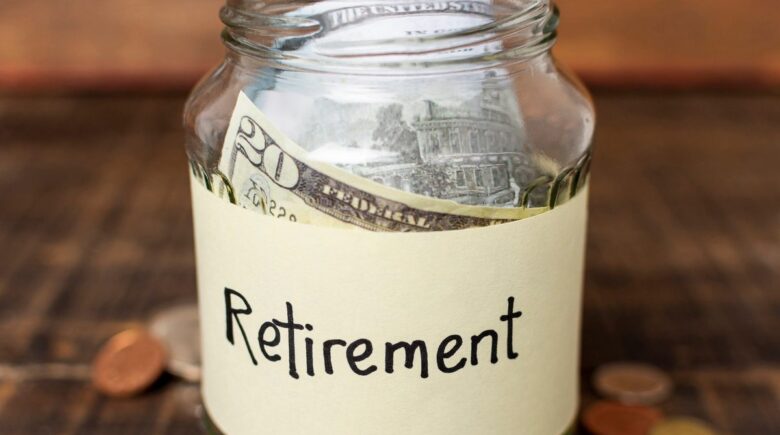 Older couple reviewing retirement budget and financial documents at home