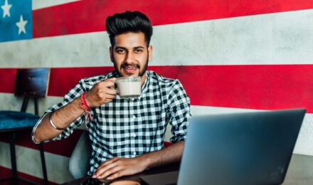 Freelancer working from home office with tax deduction information