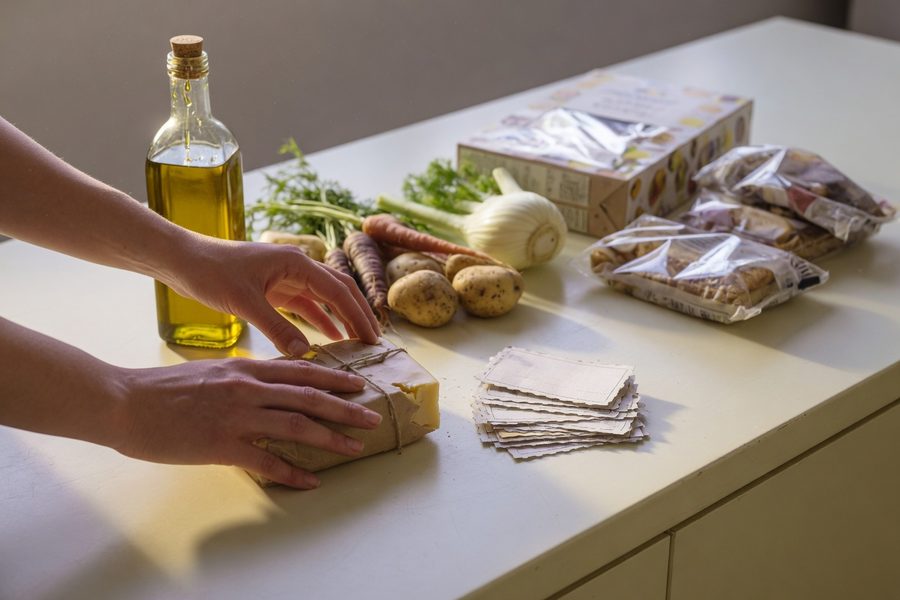 Shopping with reusable glass jars at bulk bins