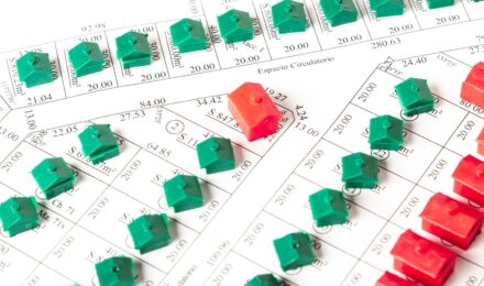 Person reviewing credit card options with a focus on balance transfer cards and debt payoff strategies